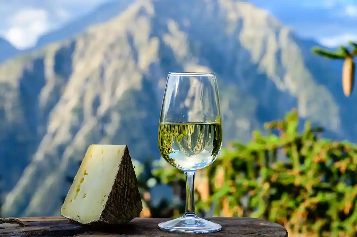 Swiss Wine and Cheese with Alpine Mountains